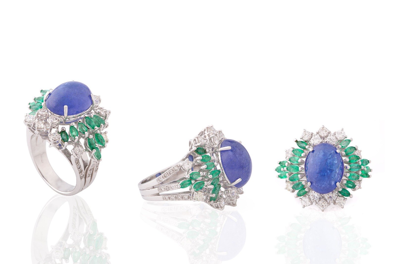 Tanzanite, emerald and diamond ring in white gold